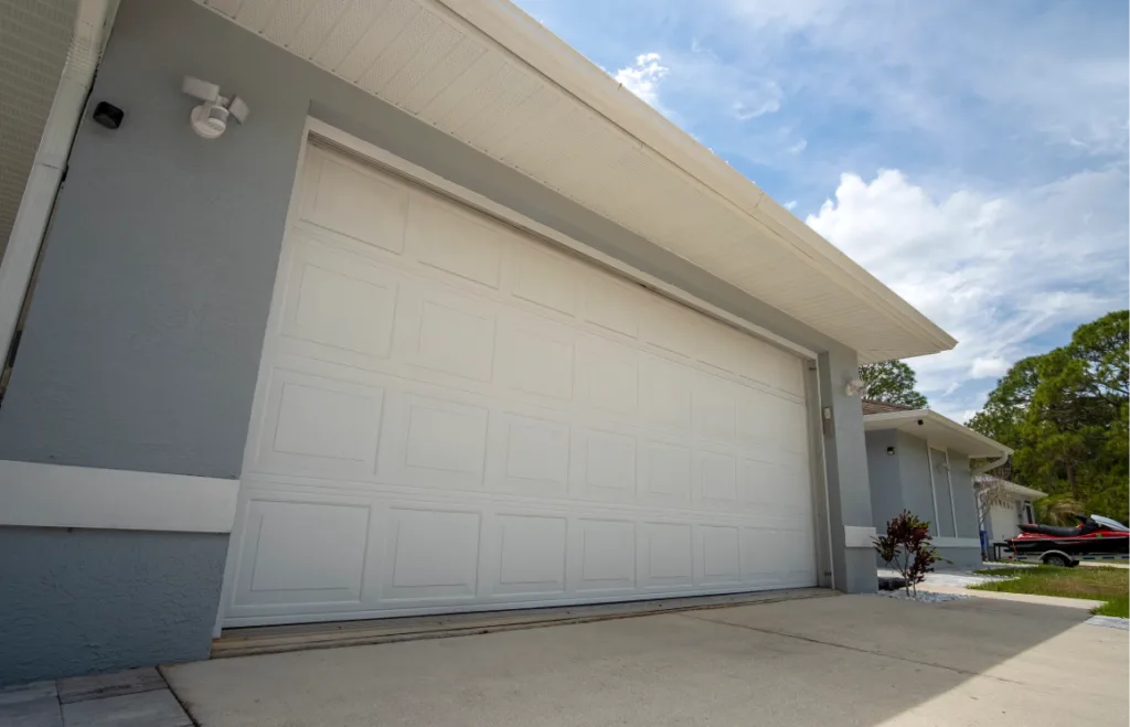 Top 10 Faqs About Garage Doors – Gates Express 1 Wide Garage Double Door And Concrete Driveway Of N 2024 10 21 18 26 58 Utc 1 1